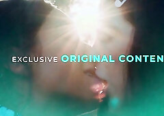 Violet Starr and Alexia Anders ignite passion in a steamy 69 on the living room couch