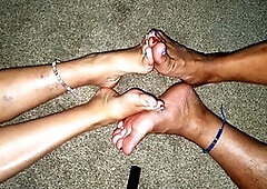 Sensual foot play with intimate foot-to-foot contact