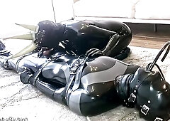 With devilish creativity, Gloomy Sweetheart keeps defenseless Alex Latex on the edge of climax whilst his throat is repeatedly banged with a rubber do