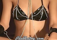 Victoria, posing in black leather lingerie