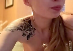 Tattooed Blonde Teases With Dildo