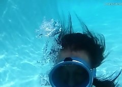 Horny diver is licking plump pussy under the water