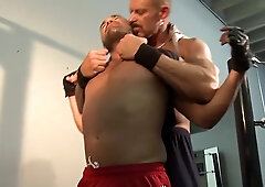 A couple of muscular men are taking a break and fucking