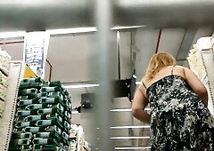 Upskirt and showing booty and pussy out of pants in a renowned super market store