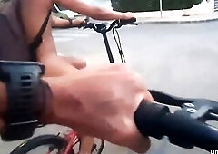 Wild Gal Biking Exposed on Public Road: Flaunting Her Body and Snatch!