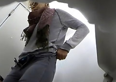 Attractive amateur blonde babe caught peeing on hidden cam