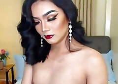 Asian shemale fucks flashlight on webcam show