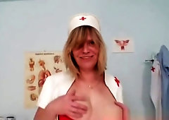 Blond-haired big juggs cougar gaping cooter on gynochair