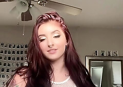 Redheaded Leggy Babe Masturbates