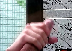 Exceptionally pretty shemale jerks off shecock by the pool