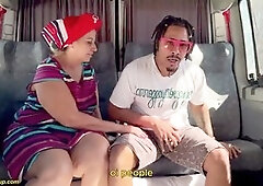 Mature woman with glasses gives a deep throat on the bus while loving anal