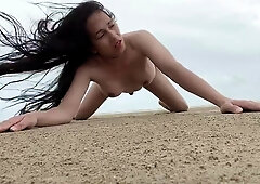 sunbating in the beach while toying her meatpipe by jaw-dropping shemal