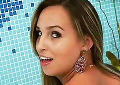 Naughty shemale masturbates in jacuzzi