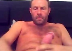 Surly mature stud jerks his big cock